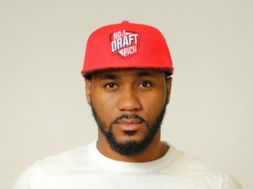 Bold red Chicago cap with curved brim and embroidered front lettering, adjustable strap for unisex streetwear style
