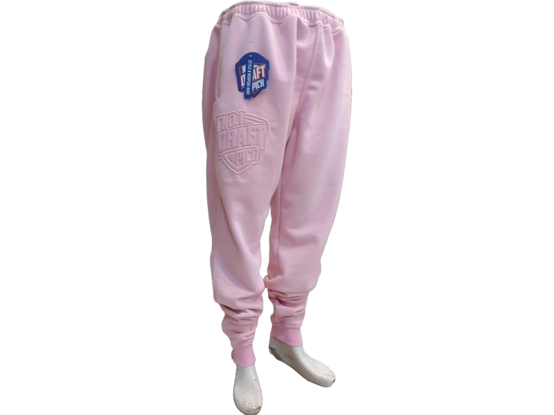 Unisex pink jogger pants with embossed branding, tapered legs, and elastic cuffs designed for casual and streetwear looks