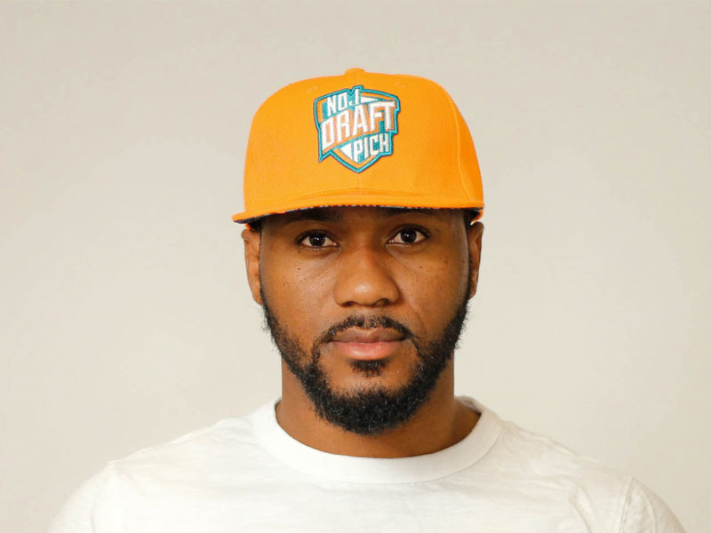 Bright orange cap with embroidered “Miami” text, curved brim, and adjustable strap for bold, unisex streetwear style

