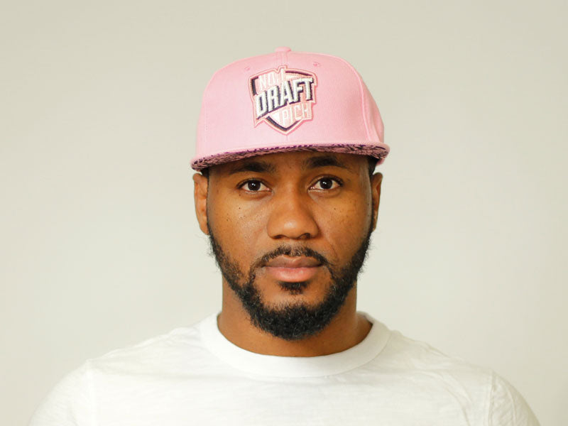 Pink Fight Cancer cap with embroidered message, curved brim, and adjustable strap for unisex awareness and support wear